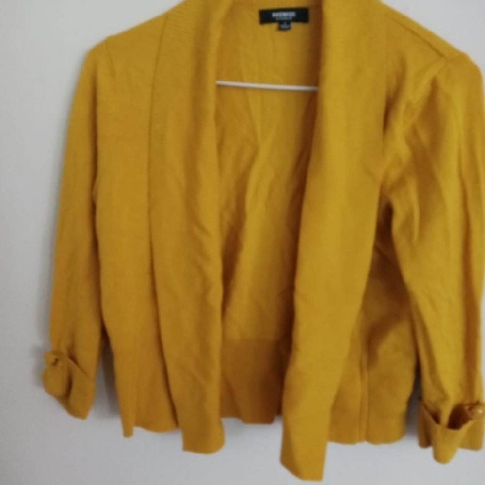 Sweater. Mustard. Used.